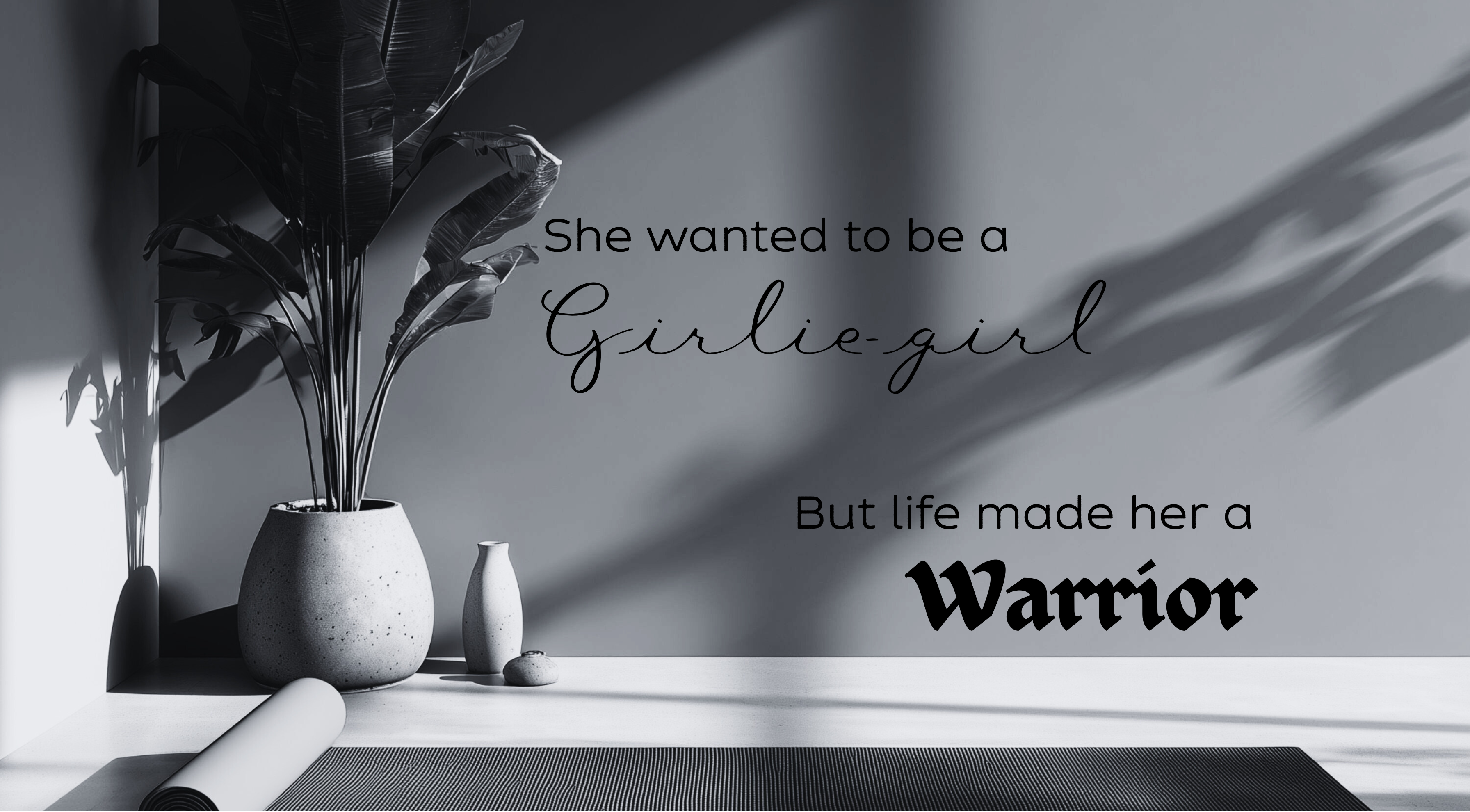 Black and white photo with a plant, vase, and motivational quote on a wall.